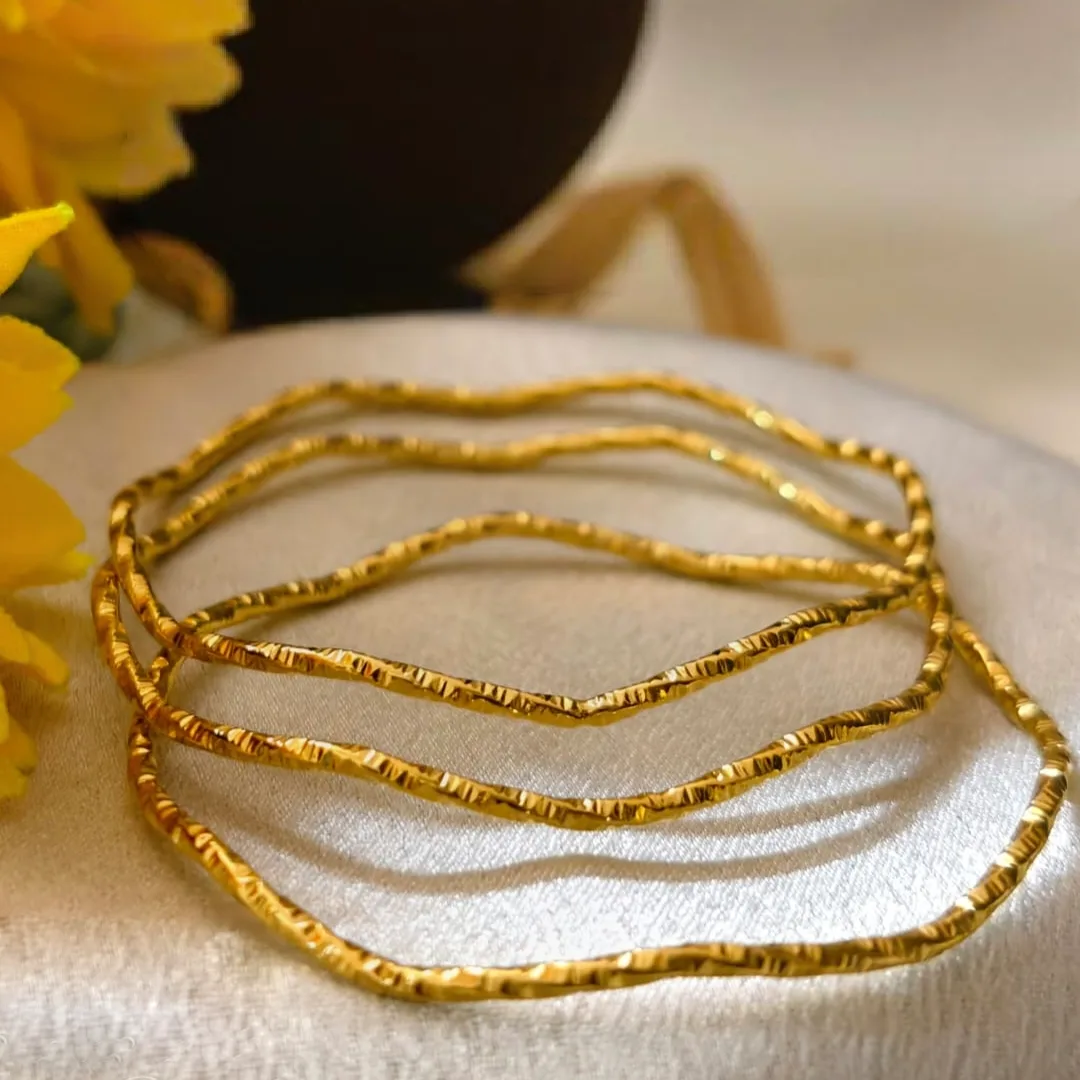 Angular Wave Gold Bangles