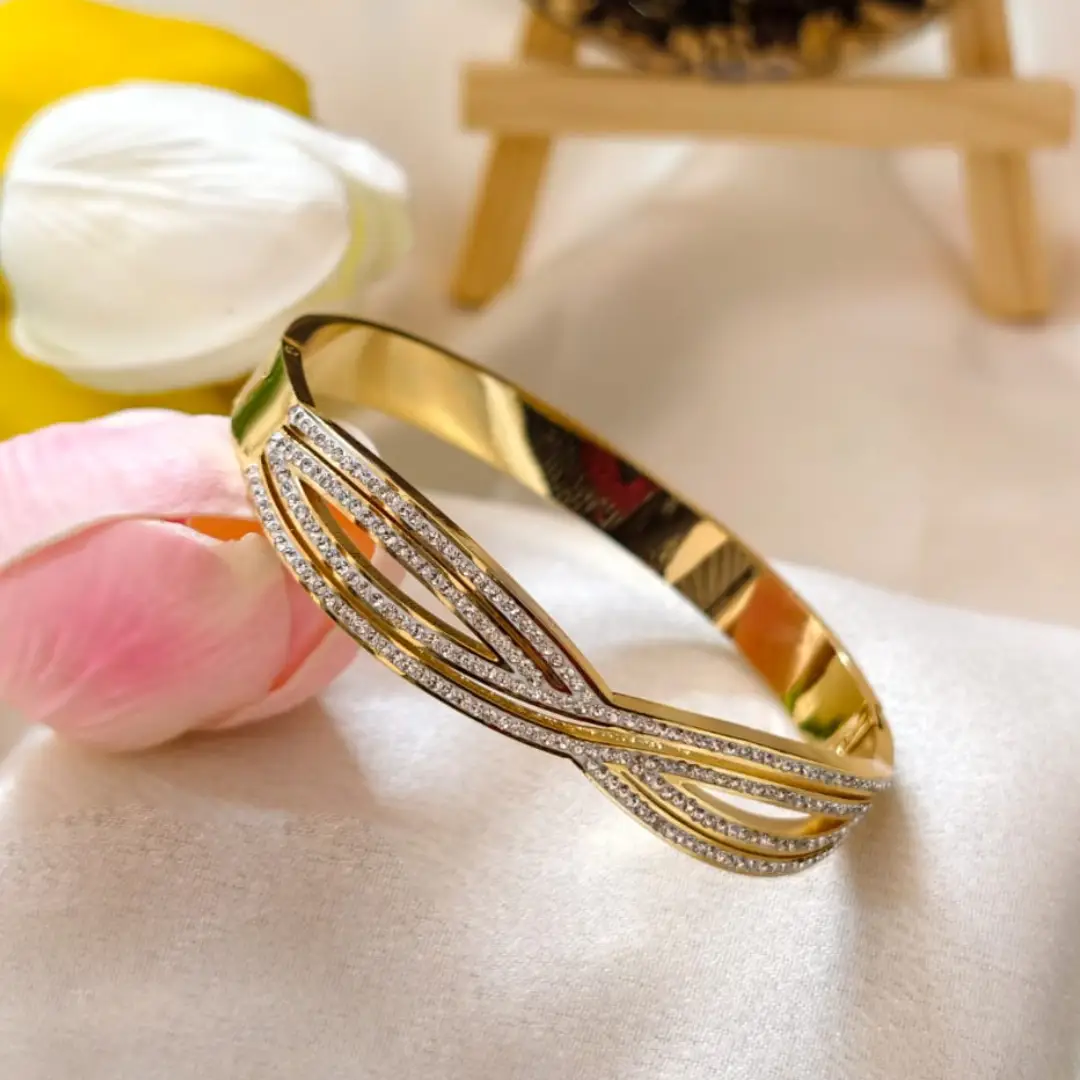 Twisted Crystal Ribbon Gold Bangle